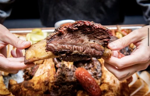 The Backyard Smokehouse Toronto exterior on Dupont Street in The Annex