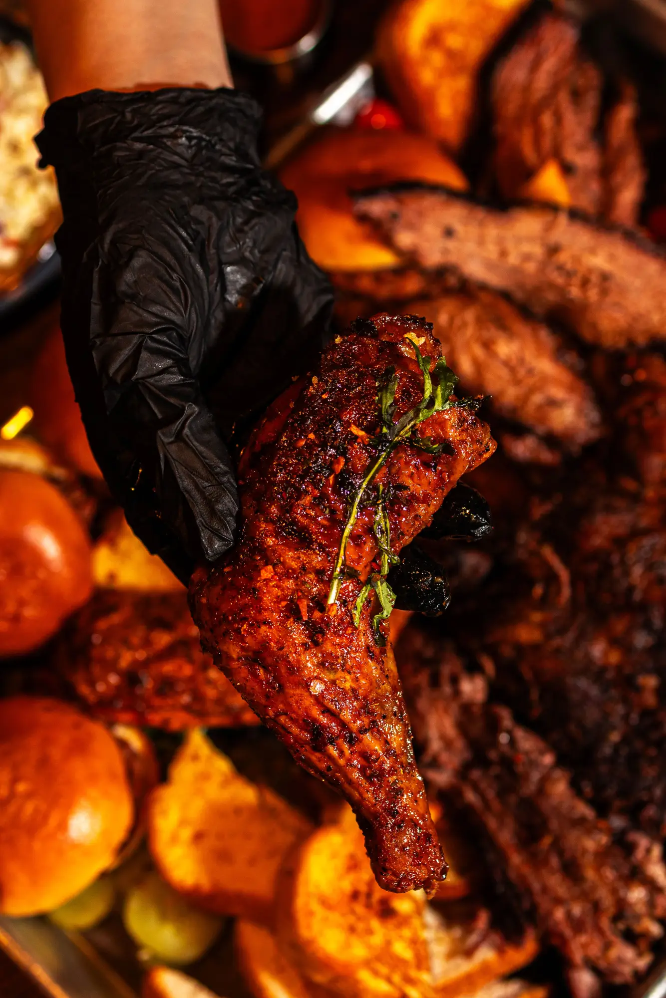 Smoked chicken served over a loaded BBQ platter at Backyard Smokehouse Toronto