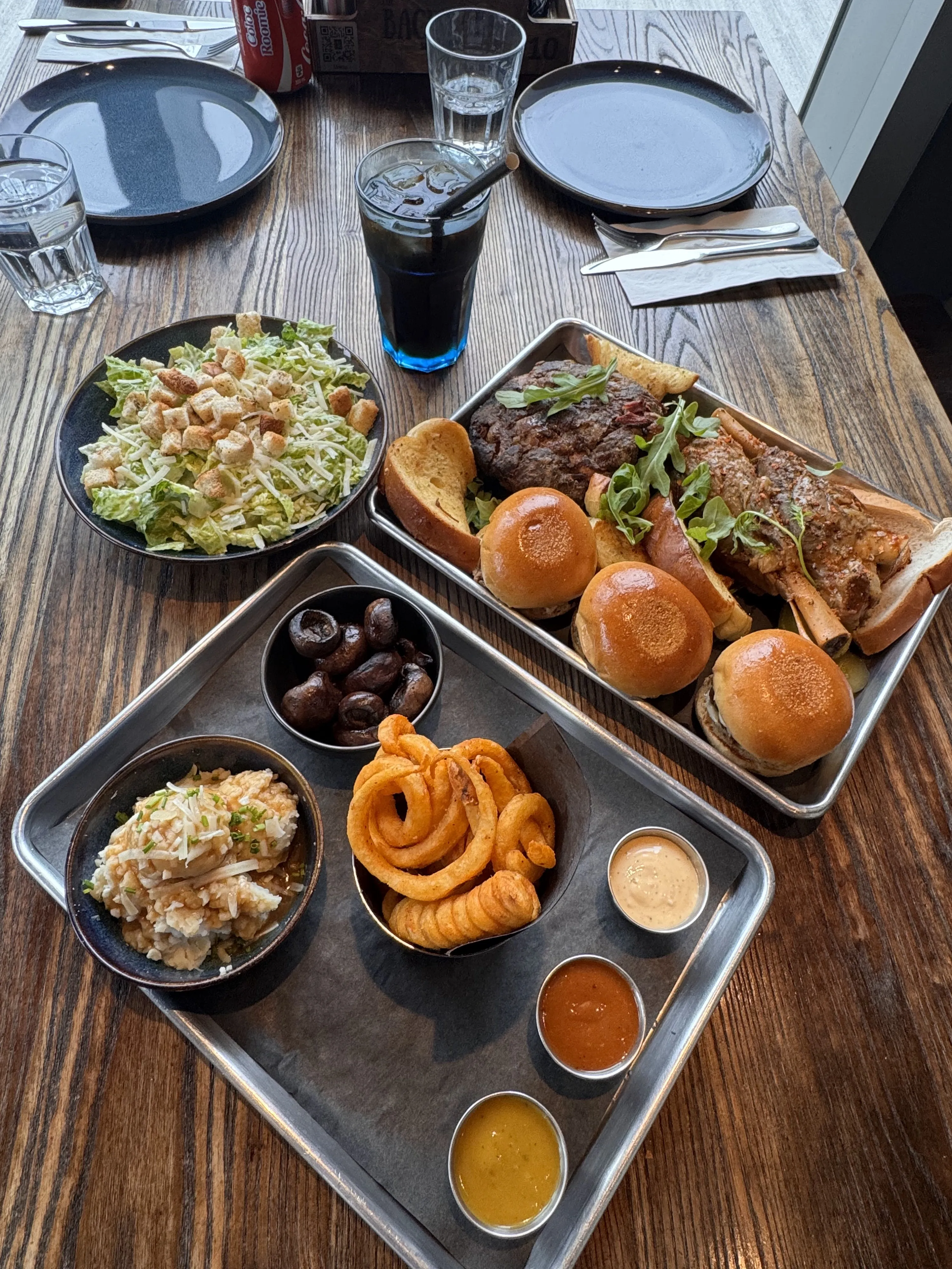 Customers enjoying BBQ dining experience at Backyard Smokehouse Mississauga