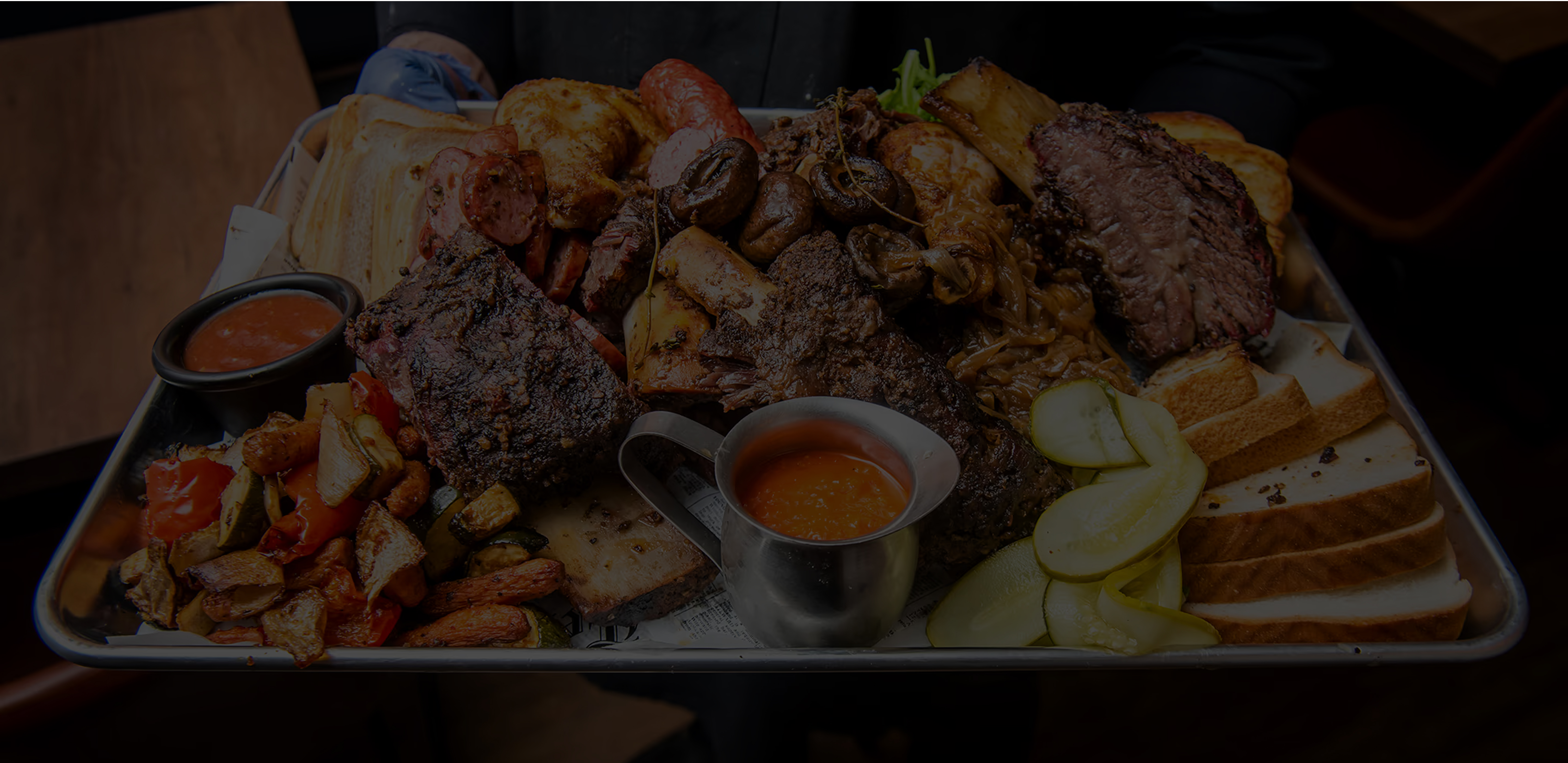 The Backyard Smokehouse — slow-smoked beef brisket BBQ"