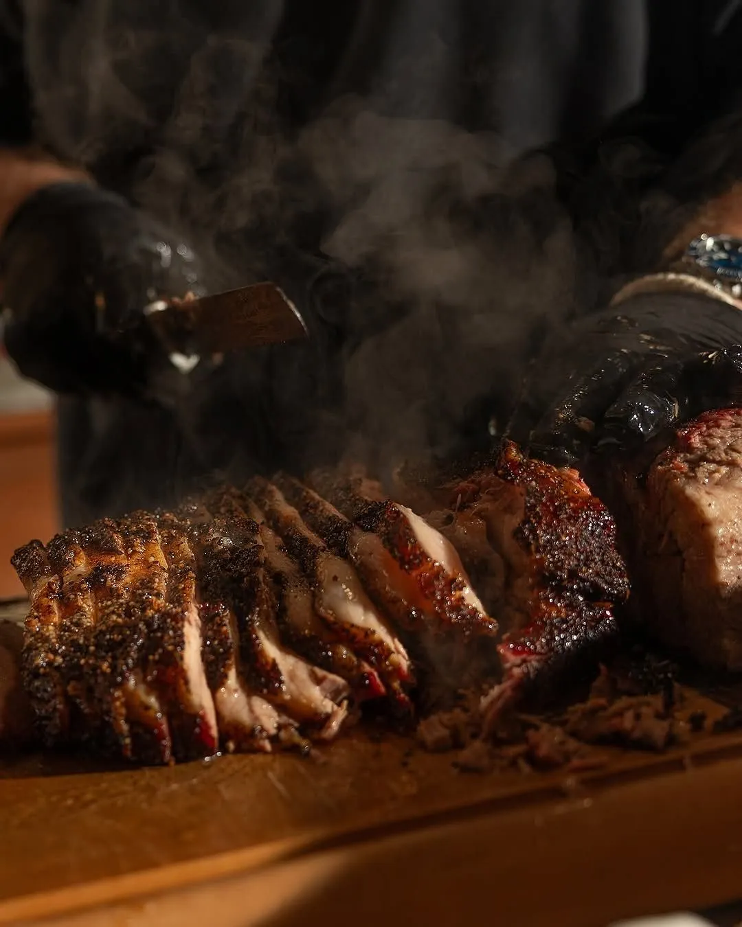 Best BBQ catering Mississauga events — Large catering platter with brisket, ribs, and traditional sides