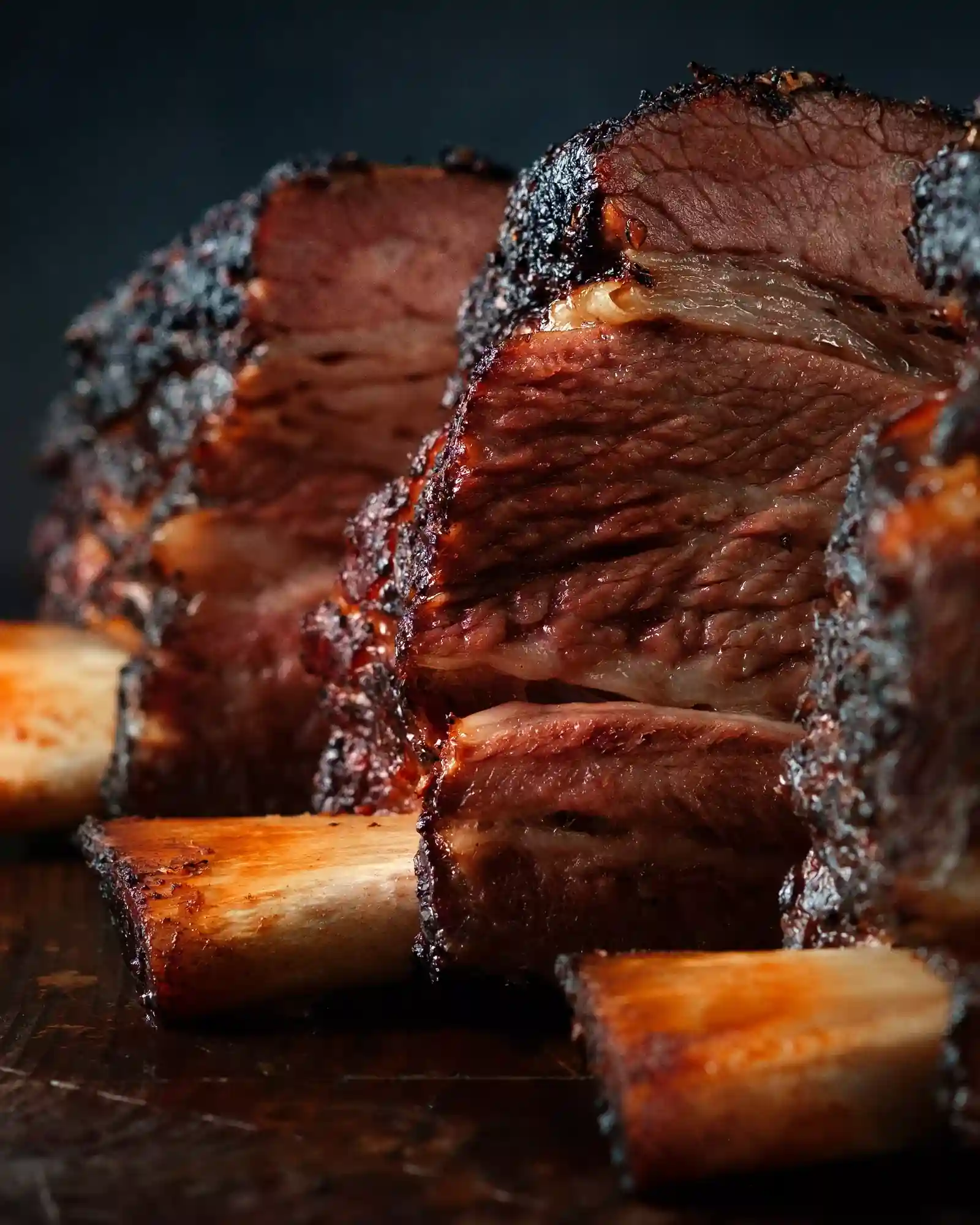 Best Father's Day dinner Toronto 2026 — Close-up of slow-smoked beef ribs with BBQ glaze