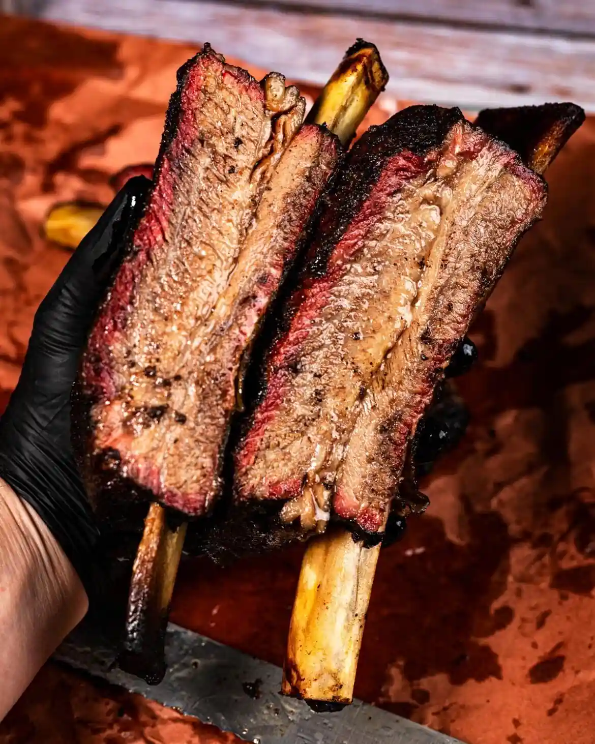 Best summer patio restaurants Edmonton 2026 — Behind the scenes in the Backyard Smokehouse pitroom